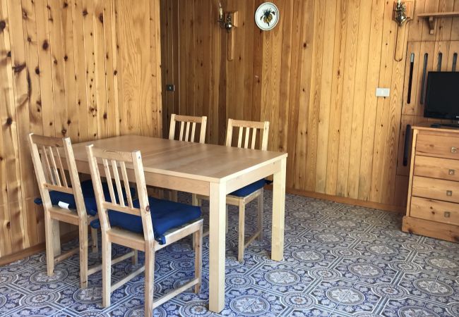 silvana-124-tavolo-pranzo-appartamento-affitto-Myhome-dolomiti appartamento-affitto-Madonna-di-Campiglio-Myhome-Dolomiti