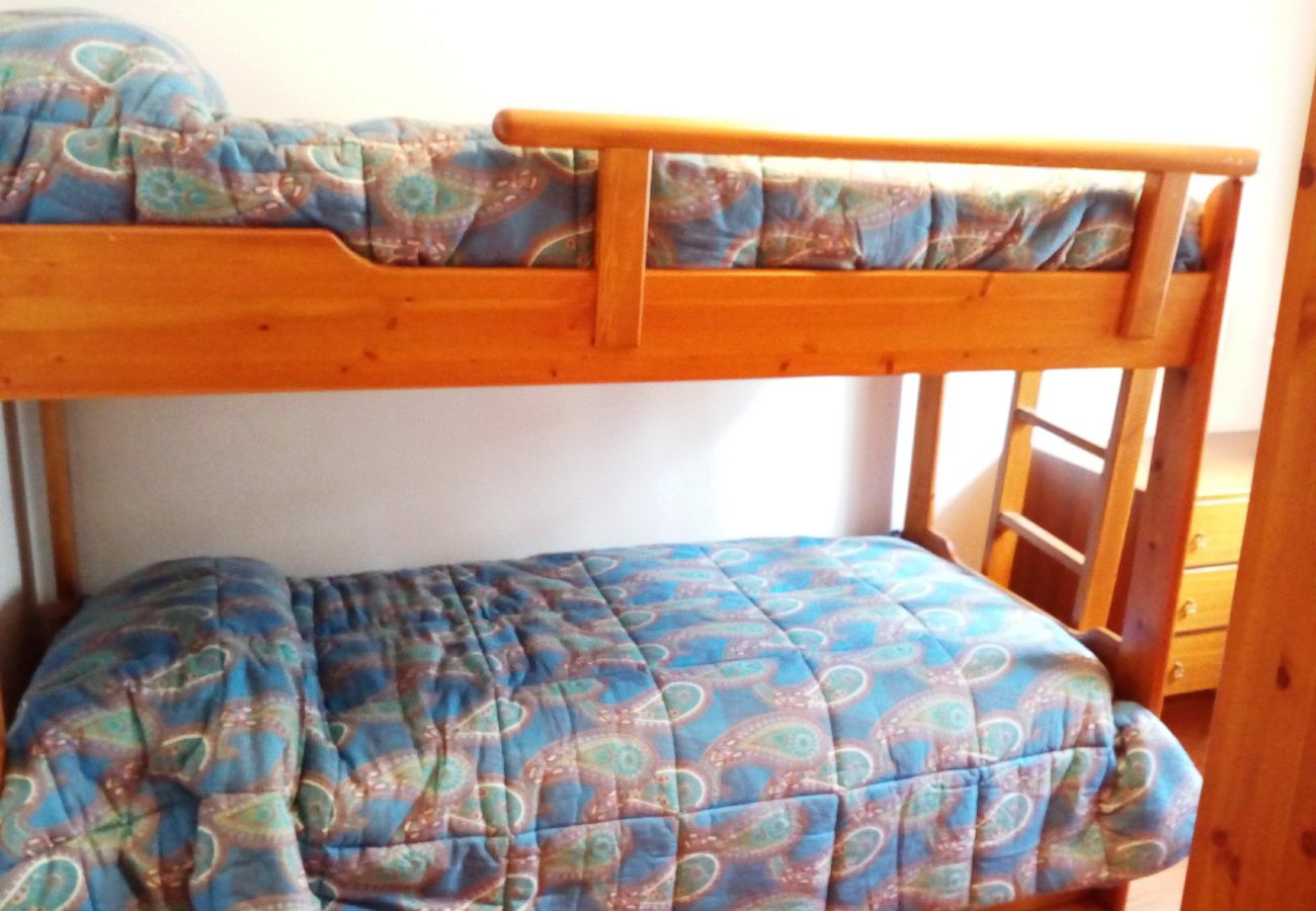 Crozzon-camera-letto-a-castello-appartamento-affitto-Myhome-dolomiti appartamento-affitto-Madonna-di-Campiglio-Myhome-Dolomiti
