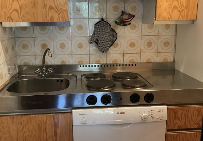 Done-cucina-appartamento-affitto-Myhome-dolomiti appartamento-affitto-Madonna-di-Campiglio-Myhome-Dolomiti