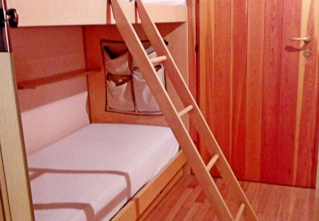 silvana-132-entrance-bunk-bed-apartment-rent-Myhome-dolomiti Holiday-apartment-rent-Madonna-di-Campiglio-Myhome-Dolomiti