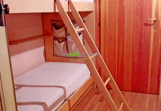silvana-132-entrance-bunk-bed-apartment-rent-Myhome-dolomiti Holiday-apartment-rent-Madonna-di-Campiglio-Myhome-Dolomiti